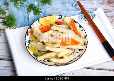 Delicious snacks pickled chilli chicken feet Stock Photo