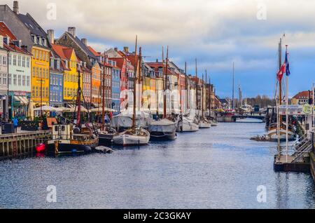View of Nyhavn pier with color buildings and ships in Copenhagen, Denmark Stock Photo