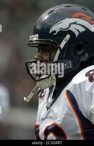 Denver, Colo., November 7, 2004) Dwayne Carswell is tackled by