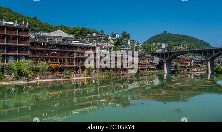 Road bridge over Tuo Jiang river in Feng Huang Stock Photo