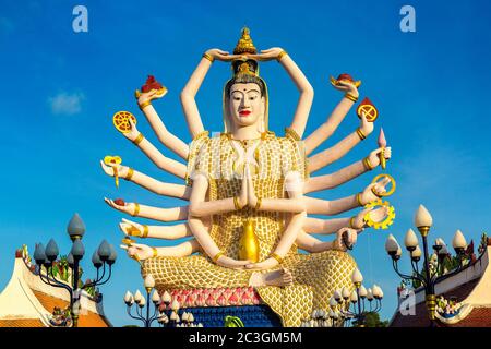 Statue of Shiva in Wat Plai Laem Temple, Samui, Thailand in a summer day Stock Photo