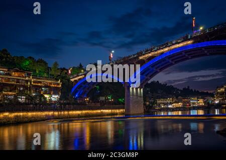 Road bridge over Tuo Jiang river in Feng Huang Stock Photo