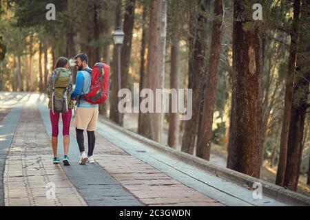 young couple hiking in beautiful nature in italy, toskana Stock Photo