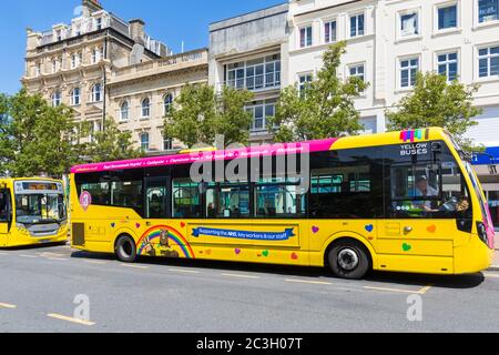 Yellow Buses bus showing support for keyworkers during Coronavirus Covid 19 pandemic at Bournemouth, Dorset UK in June Stock Photo