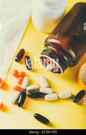 Download Bottle And Pills On Yellow Background Medicine Healthcare Pharmacy Concept Coronavirus Stock Photo Alamy Yellowimages Mockups