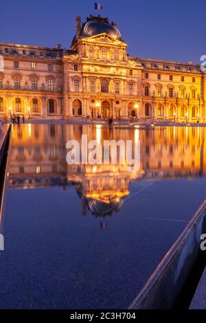Courtyard of the Louvre, Paris, France, at dusk Stock Photo