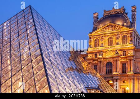 Courtyard of the Louvre, Paris, France, at dusk Stock Photo