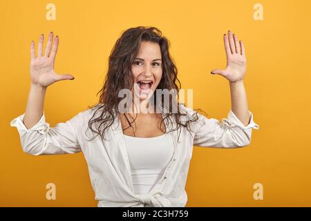 Showing 10 ten fingers hand gesture, show number three with hands, pointing up Stock Photo