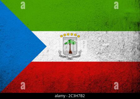 The Republic of Equatorial Guinea National flag with coat of arms. Grunge background Stock Photo