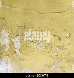 Old peeled yellow wall Stock Photo