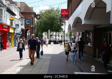 Ashford, Kent, UK. 20 June, 2020. Following the announcement by the government that non essential shops can open, the Ashford town centre high street appears busier than it has in the past few months of the Coronavirus pandemic during the first weekend of shops opening. Photo Credit: Paul Lawrenson/Alamy Live News Stock Photo