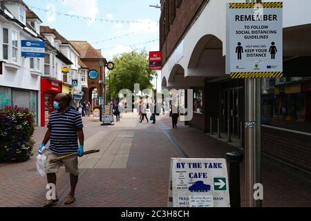 Ashford, Kent, UK. 20 June, 2020. Following the announcement by the government that non essential shops can open, the Ashford town centre high street appears busier than it has in the past few months of the Coronavirus pandemic during the first weekend of shops opening. Photo Credit: Paul Lawrenson/Alamy Live News Stock Photo