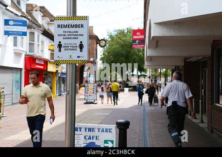 Ashford, Kent, UK. 20 June, 2020. Following the announcement by the government that non essential shops can open, the Ashford town centre high street appears busier than it has in the past few months of the Coronavirus pandemic during the first weekend of shops opening. Photo Credit: Paul Lawrenson/Alamy Live News Stock Photo