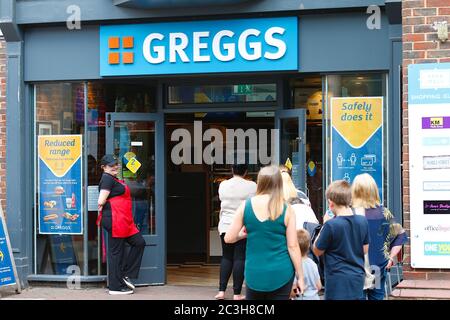 Ashford, Kent, UK. 20 June, 2020. Following the announcement by the government that non essential shops can open, the Ashford town centre high street appears busier than it has in the past few months of the Coronavirus pandemic during the first weekend of shops opening. Photo Credit: Paul Lawrenson/Alamy Live News Stock Photo