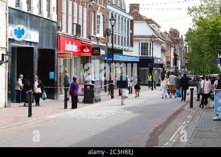 Ashford, Kent, UK. 20 June, 2020. Following the announcement by the government that non essential shops can open, the Ashford town centre high street appears busier than it has in the past few months of the Coronavirus pandemic during the first weekend of shops opening. Photo Credit: Paul Lawrenson/Alamy Live News Stock Photo