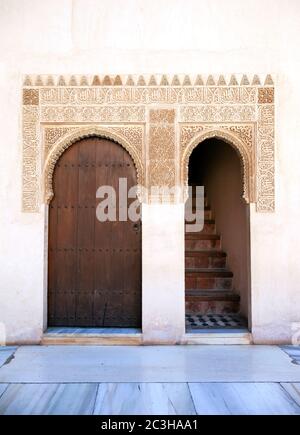 Ornate door and staircase. Nazrid Palace, Alhambra, Spain Stock Photo