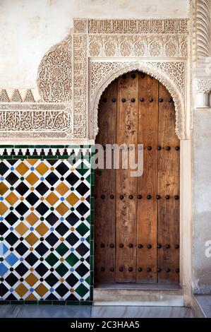 Ornate door and tile work. Nazrid Palace, Alhambra, Spain Stock Photo