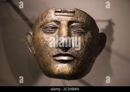 Leiden, The Netherlands - JAN 04, 2020: closeup of an old visor mask from ancient Rome found in The Netherlands. Ancient Roman Empire. Made of Iron Stock Photo