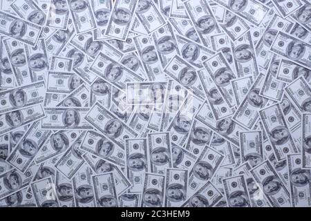 Group of money stack of 100 US dollars banknotes a lot of the background texture top view Stock Photo