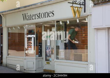 Carmarthen, UK. 20 June, 2020. The window display in Waterstones, Carmarthen is updated as shops prepare to open following the Welsh Government announced on Friday that non-essential shops could re-open on Monday. Credit: Gruffydd Ll. Thomas/Alamy Live News Stock Photo