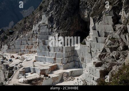 Vertical shot of marble blocks near the town of Carrara in Tuscany Italy Stock Photo