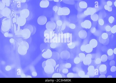 blue purple white blurred lights of diode garland, blurry full frame background Stock Photo
