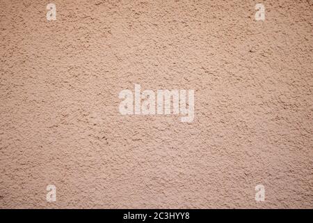 Brown, beige color, plaster rough painted background texture, building facade wall grunge material Stock Photo