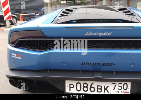 Moscow. Autumn 2018. Bright blue Lamborghini Huracan parked on the street. Backlights and grill view. Stock Photo