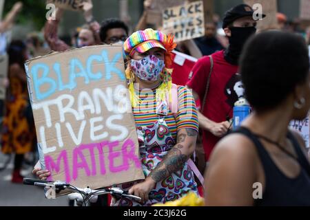 London, UK. 20th June, 2020. LGBTQ BLM Protestors march around London. Protests have been taking place across the UK for several weeks now in support of the Black Lives Matter movement. Credit: Liam Asman/Alamy Live News Stock Photo