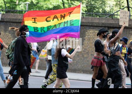 London, UK. 20th June, 2020. LGBTQ BLM Protestors march around London. Protests have been taking place across the UK for several weeks now in support of the Black Lives Matter movement. Credit: Liam Asman/Alamy Live News Stock Photo