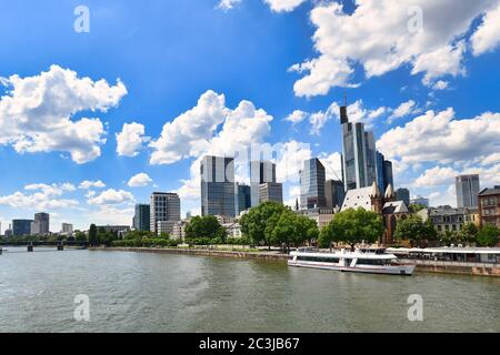 Frankfurt am Main, Germany - June 2020:  Main river and view on tall skyscrapers of financial district of modern Frankfurt city center Stock Photo