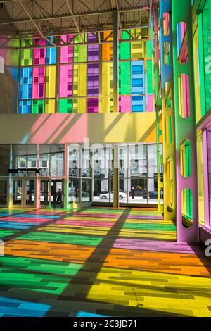 MONTREAL, CANADA - AUGUST 20th 2014: The colourful stained glass Palais des congres de Montreal, a covention and exhibition centre located in Downtown Stock Photo