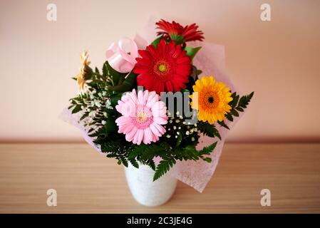 Flower arrangement in a ceramic vase ( Gerbera ) Stock Photo