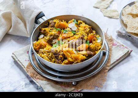 Lamb and apricot biryani with sweet potatoes Stock Photo