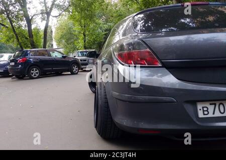 Side view of black Opel Astra building with Uber taxi sticker on it  transporting passengers in Azeri capital Stock Photo - Alamy