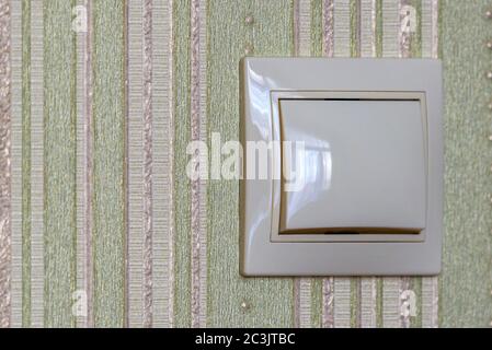 Plastic light switch, turn on or turn off the lights. Stock Photo