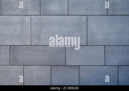 Background from dark tiles under granite style Stock Photo