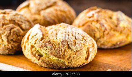 Traditional Brazilian biscuit called 'Broa de Milho ou de fubá'. Made with cornmeal or corn flour. Regional festivities in Brazil. Stock Photo