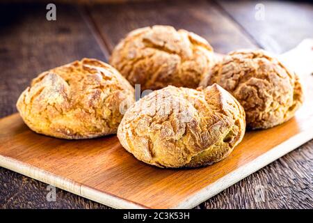 Traditional Brazilian biscuit called 'Broa de Milho ou de fubá'. Made with cornmeal or corn flour. Regional festivities in Brazil. Stock Photo