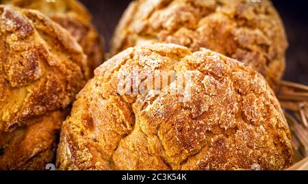 Traditional Brazilian biscuit called 'Broa de fubá ou broinha'. Made with corn flour. Brazilian cuisine. Stock Photo