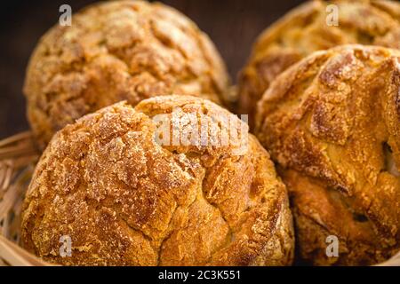 Traditional Brazilian biscuit called 'Broa de fubá ou broinha'. Made with corn flour. Brazilian cuisine. Stock Photo