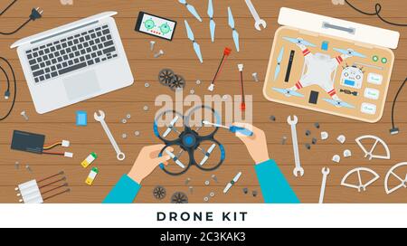Drone kit. Vector flat illustrations. The hand man working with quadcopter tools on the table. Stock Vector