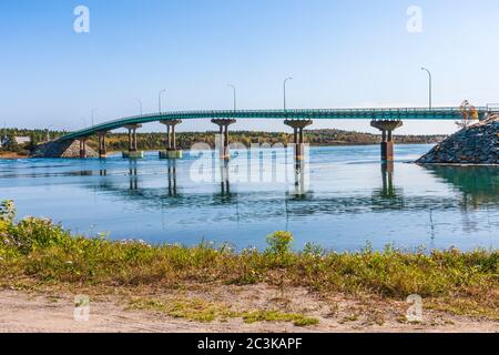 FDR Memorial Bridge between Lubec, Maine and Campobello Island in New Brunswick, Canada. The narrow channel between Lubec, Maine, a fishing village, a Stock Photo