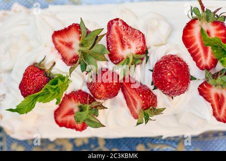 Freshly baked sweet strawberry Long-Cake Roll, also called Strawberry roulade