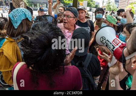 A coalition of pro-choice and civil rights groups protest the event 'Jesus Matters,' organized by two anti-abortion hate groups, Love Life and Operation America, and headlined by far-right minister Flip Benham (pink shirt), who was featured in the documentary 'AKA Jane Roe', in Cooper Triangle in New York City on June 20, 2020. (Photo by Gabriele Holtermann/Sipa USA) Credit: Sipa USA/Alamy Live News Stock Photo