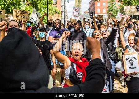 London, UK. 20th June, 2020. Protesters chant slogans during the demonstration.Black Lives Matter protests continue in The UK since the death of George Floyd at the hands of police officer in Minneapolis. Credit: SOPA Images Limited/Alamy Live News Stock Photo