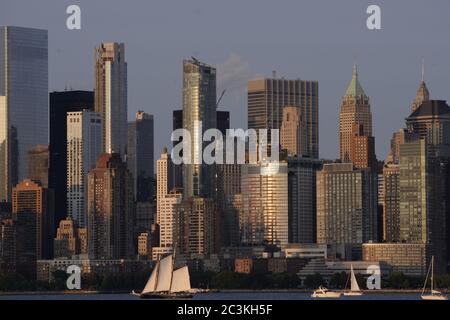 New York City Best Skyline panorama in USA views from Liberty State Park ferry boat on Hudson river Stock Photo