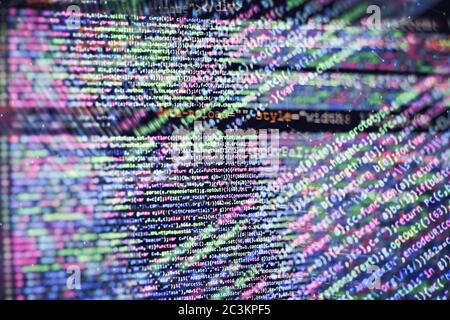 CSS, JavaScript and HTML usage. Monitor closeup of function source code. Abstract IT technology background. Software source code. Stock Photo