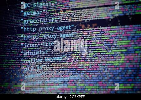 CSS, JavaScript and HTML usage. Monitor closeup of function source code. Abstract IT technology background. Software source code. Stock Photo