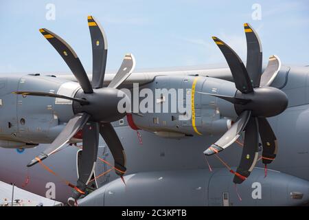 Singapore - February 17, 2016: Engines and propellers of an Airbus A400M on display during Singapore Airshow at Changi Exhibition Centre in Singapore. Stock Photo